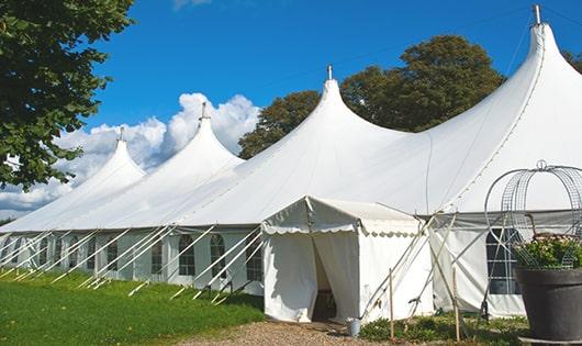 high-quality porta potties stationed at a wedding, meeting the needs of guests throughout the outdoor reception in Bagdad